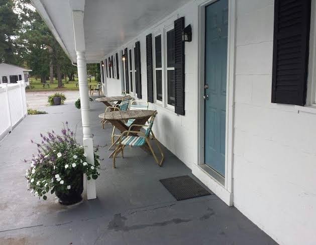 Shaded porch outside the rooms